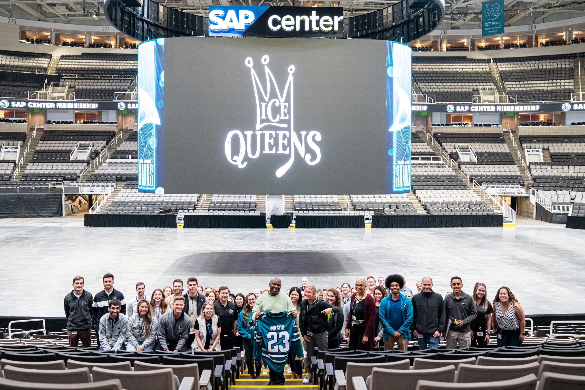 Team Teal hosts filmmaker Kwame Brown for a viewing of his documentary "Ice Queens" on the center hung scoreboard at SAP Center.