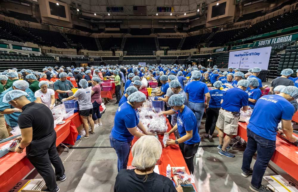 Employees volunteering at a food bank