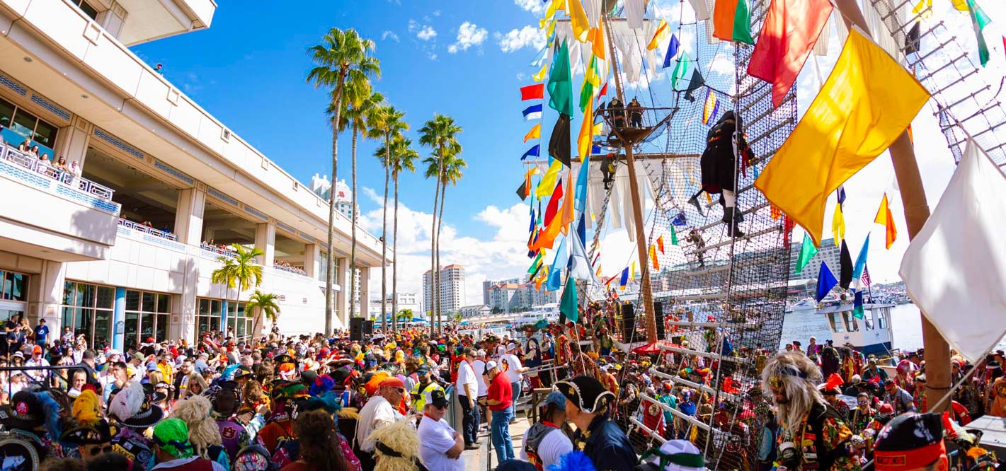 Gasparilla Island in Tampa full of people outside on a sunny day